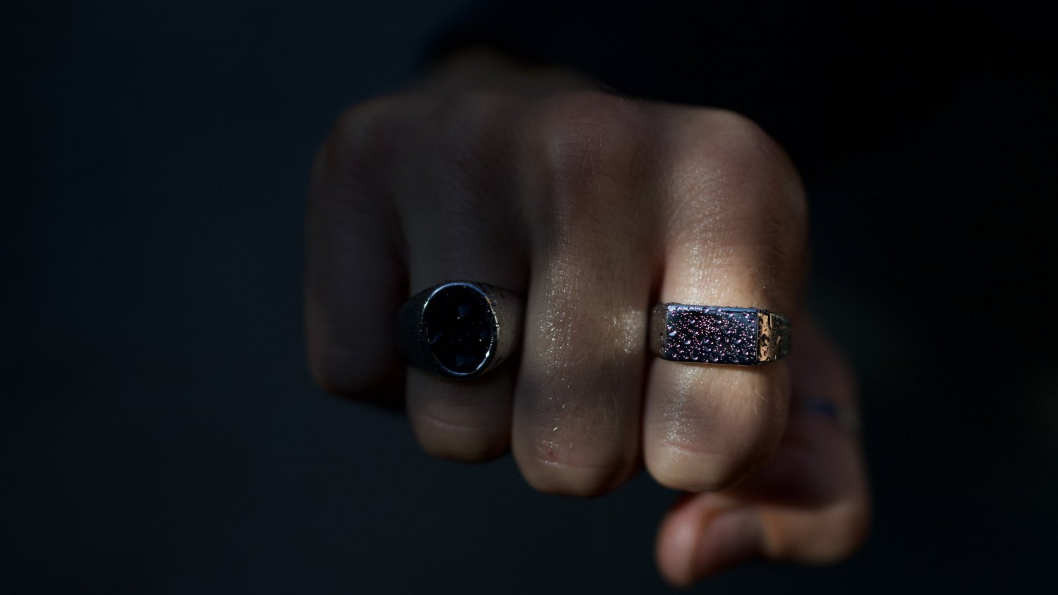 hand with water resistant rings