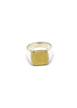 Silver ring with gold flat face