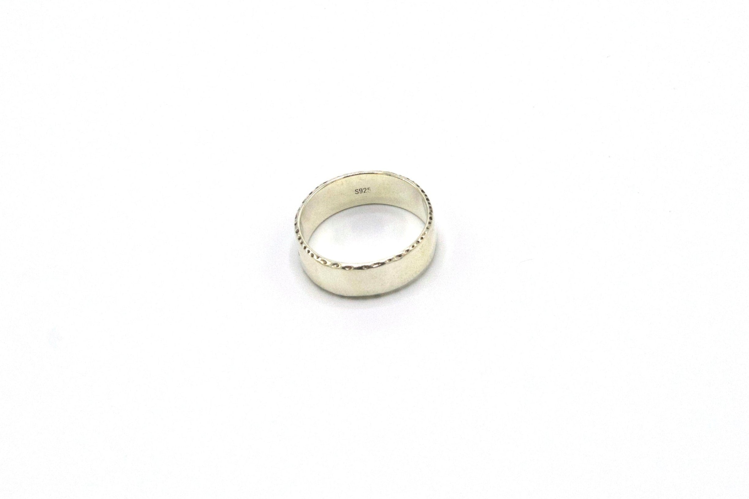 silver ring with feather from backside